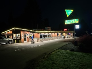Restaurant entrance with warm white roofline lighting